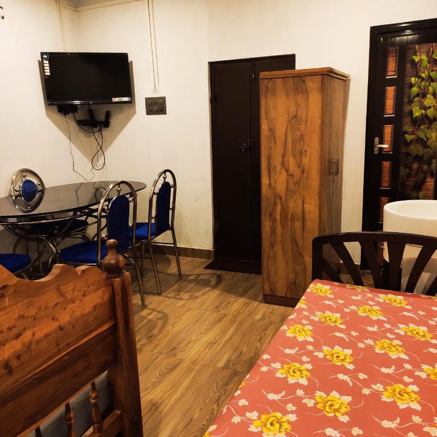 Munroe Inn Homestay Коллам Экстерьер фото
