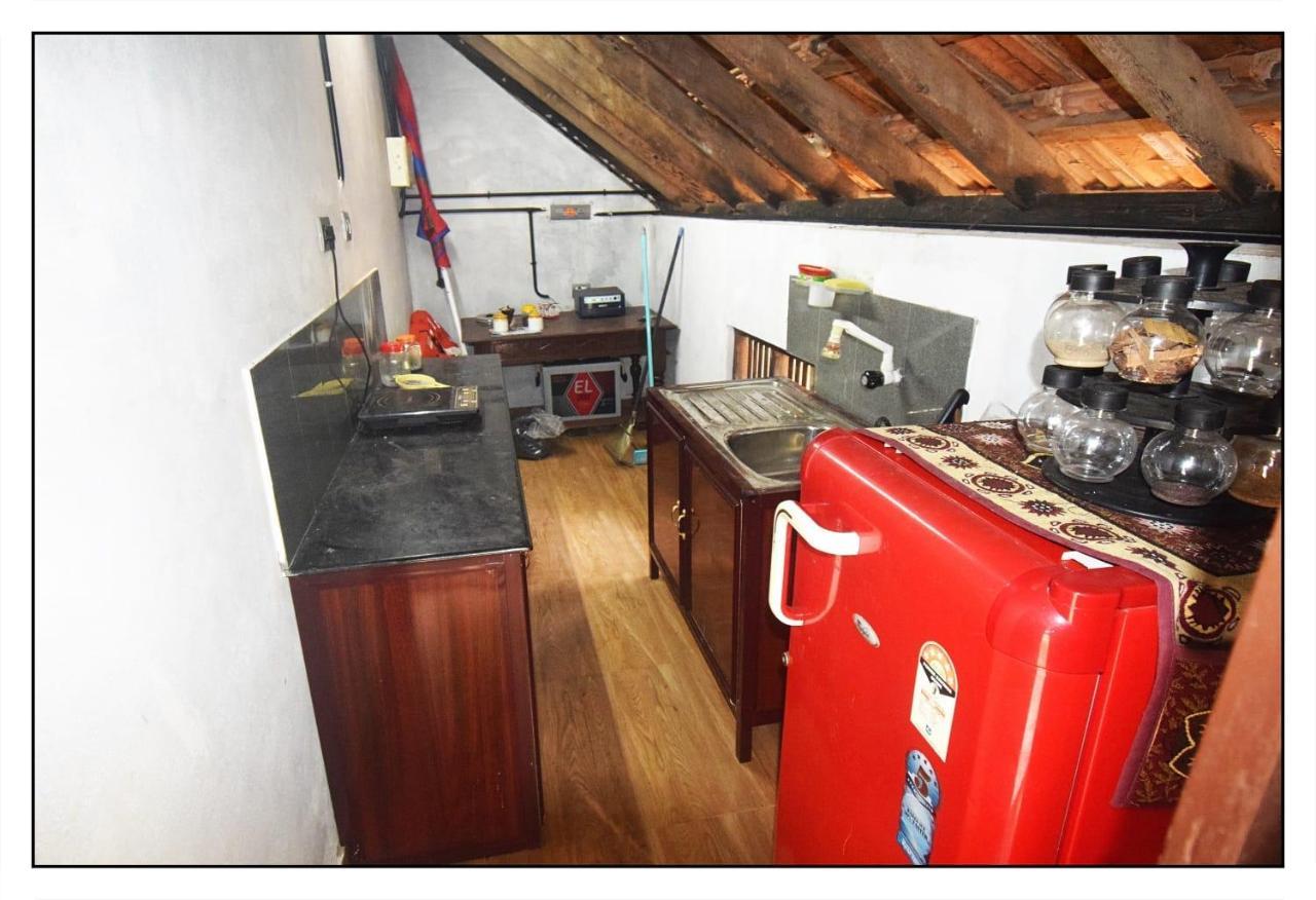 Munroe Inn Homestay Коллам Номер фото