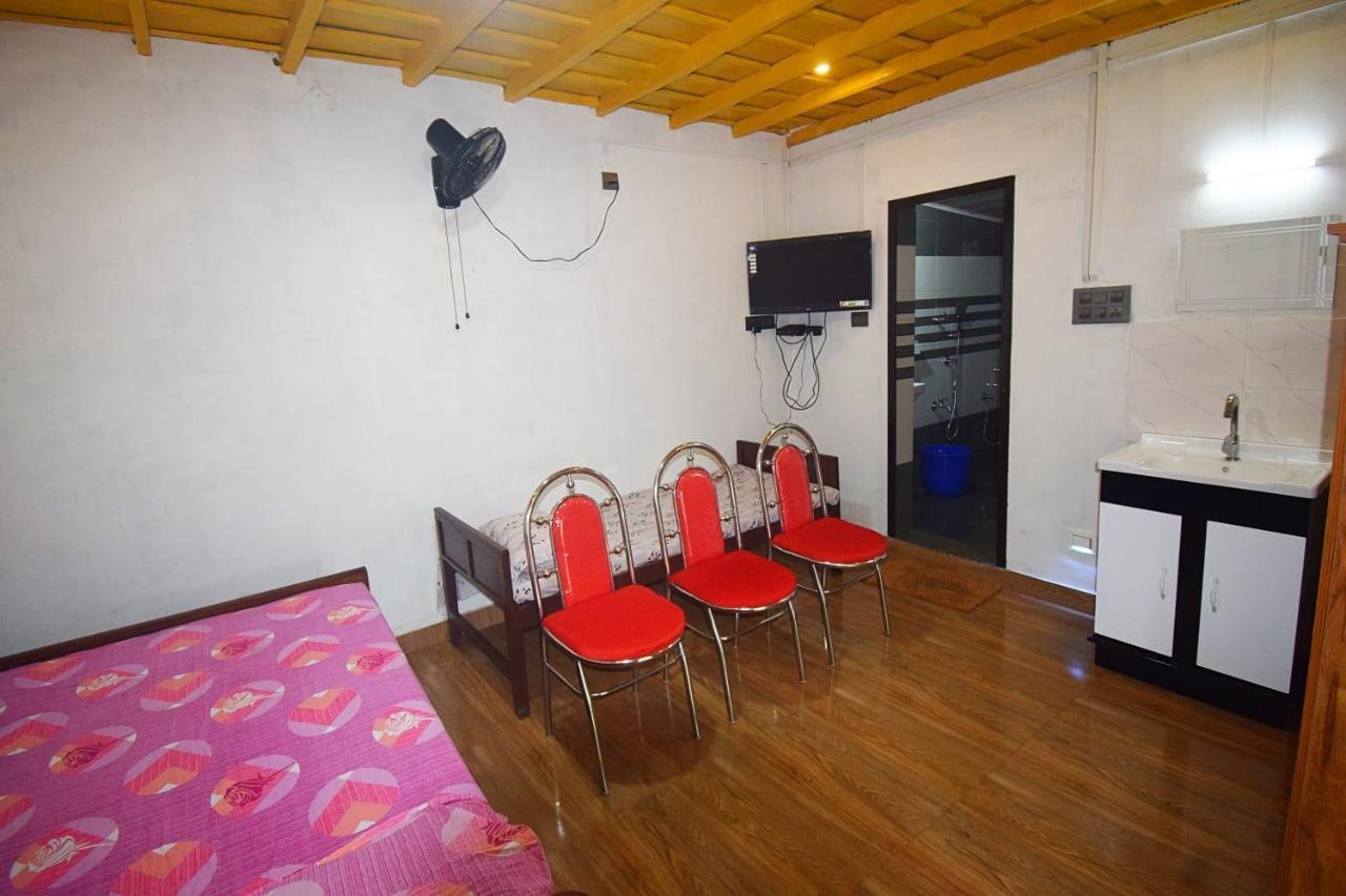Munroe Inn Homestay Коллам Экстерьер фото